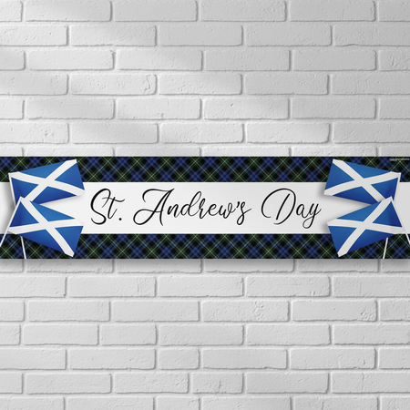St. Andrew’s Day banner on a white brick wall
