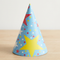 Star-patterned party hat on a wood table with a neutral background, close up in square format