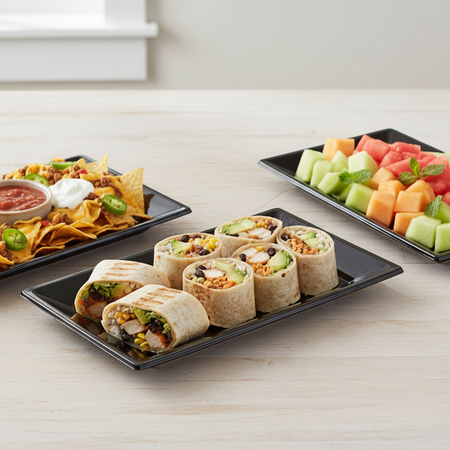 Three Black Platters Close Together Filling Frame