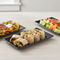 Three Black Platters Close Together Filling Frame