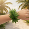 Tropical Fern Leaf Wristlet on Wrist Close Up