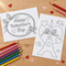 Two Valentine’s colouring sheets slightly overlapping on a wooden table with colouring pencils, viewed from above in square format