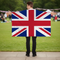 Union Jack Body Cape with Concrete and Grass Background