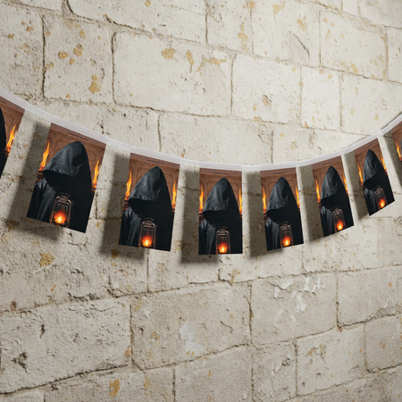 Updated bunting on the stone wall with clear white bias binding across the tops of the pennants