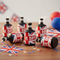 VE Day Party Poppers In Situation on Table