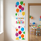 Welcome to the Party banner beside an open doorway into a children’s party hall, with the banner in focus in a square image