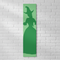 Witches of Oz Green Banner on White Brick Wall