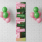 Witches of Oz Portrait Banner on White Brick Wall with Balloons