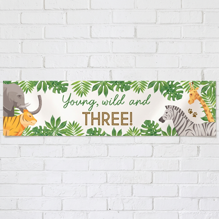 Young, wild and THREE banner on a white brick wall with soft light and shade, square format